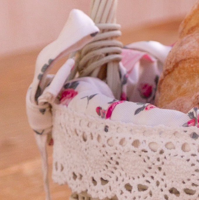 Bamboo wicker basket with handles and floral lining