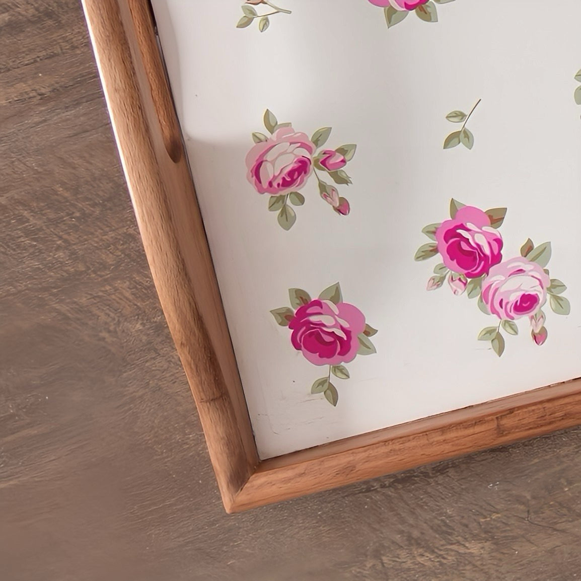 Rustic wooden tray with floral print detail