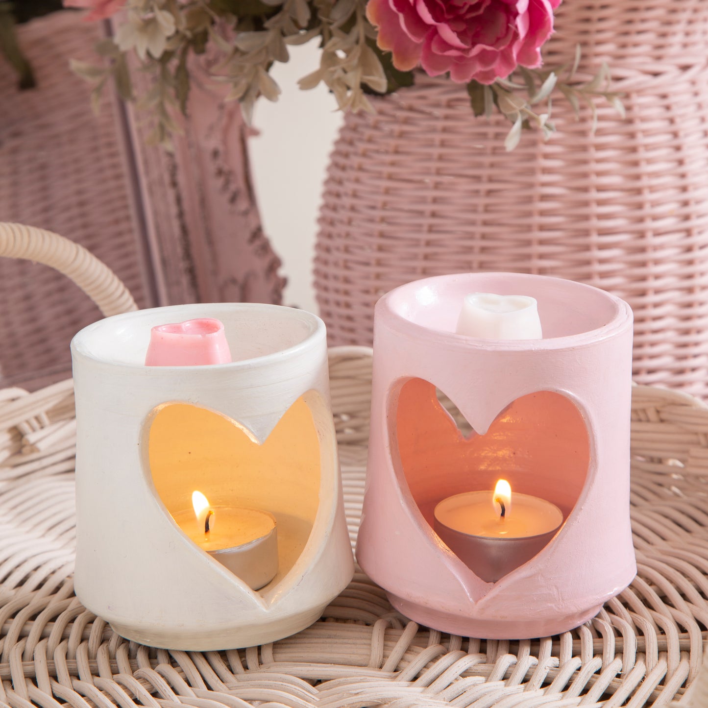Pottery oil burner with heart-shaped carving