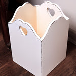 Distressed wooden basket with heart-shaped handles