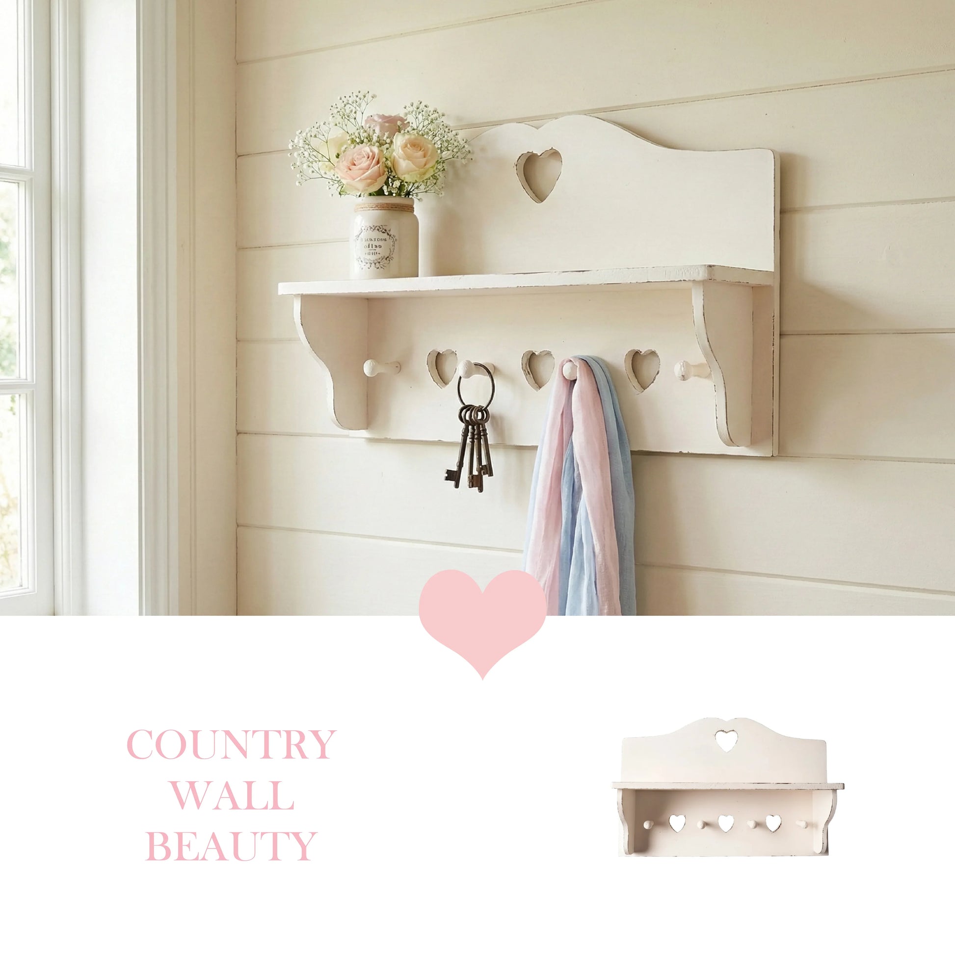 Wooden wall shelf with heart-shaped cutout and hooks holding keys and fabric, and a small plant on a shelf.