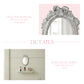 Ornate white oval mirror with a ribbon crest and a close-up of its distressed texture with pink descriptive text.