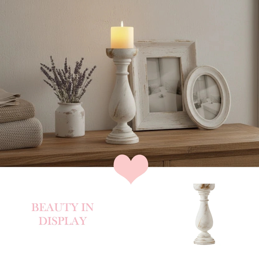 Decorative candle holder on a rustic wooden table with elegant home decor items on display.