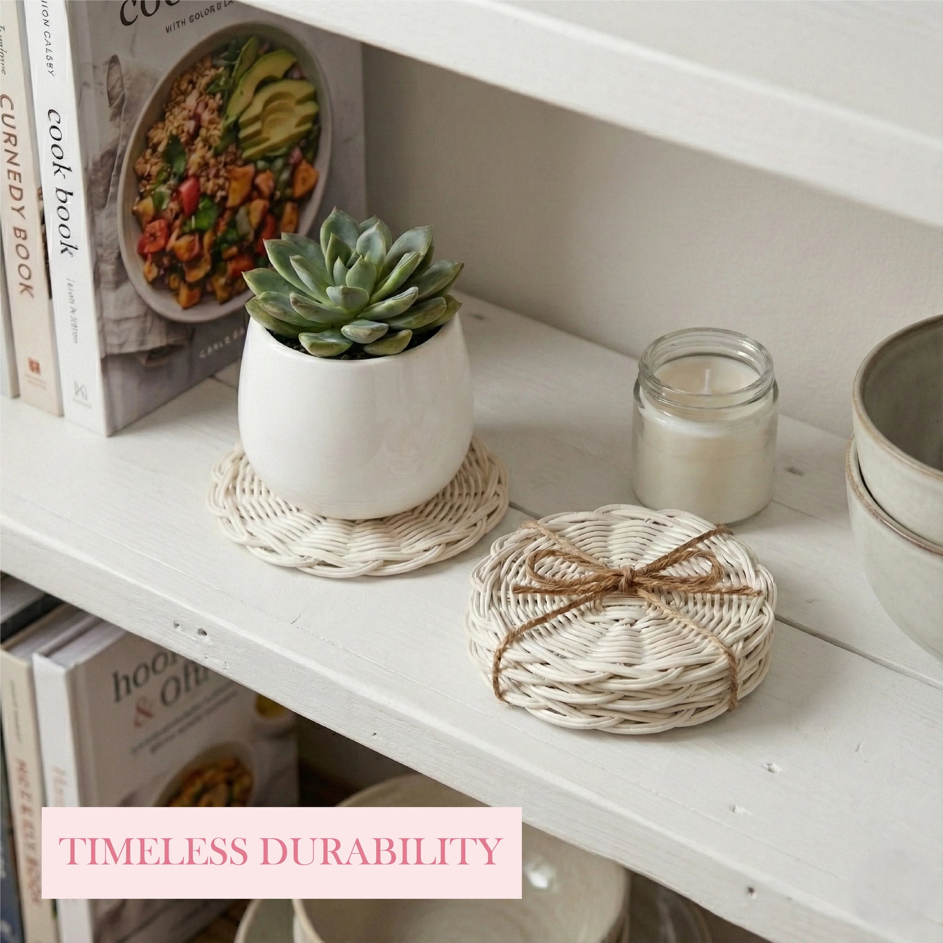 White shelf with a potted succulent, candle, and woven coasters with 'Timeless Durability' text.