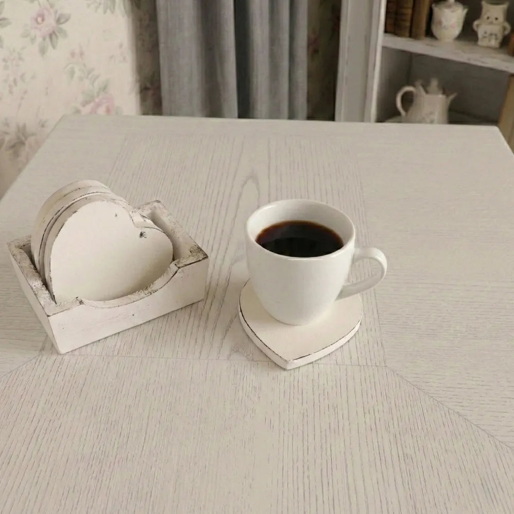 Country Charm Heart-Shaped Coasters with Wooden Holder beside white mug with drink on textured surface home decor scene
