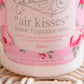 Close-up of air kisses home fragrance mist bottle with pink floral label and 250ml capacity