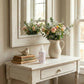Country Charm Scent of Love Home Fragrance spray bottle styled on white dresser with flowers and books in bright room setting