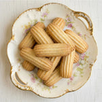 Country Charm Signature Nashader Biscuits on decorative plate light wooden surface
