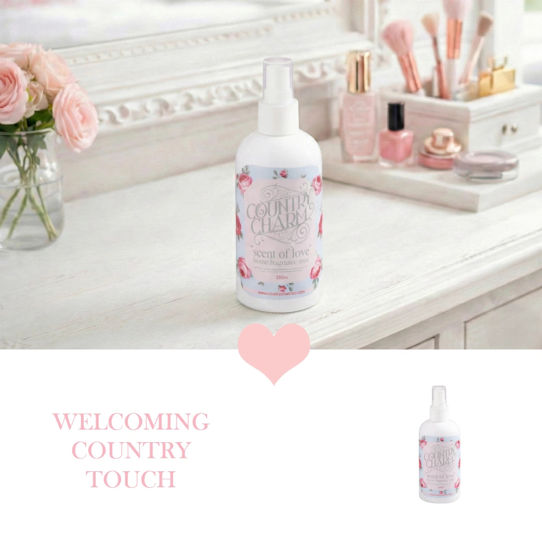 Bottle of Country Charm spray on a vanity with makeup and flowers
