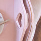 Country Heart Cut-Out Tray with floral teacup on pink surface close-up