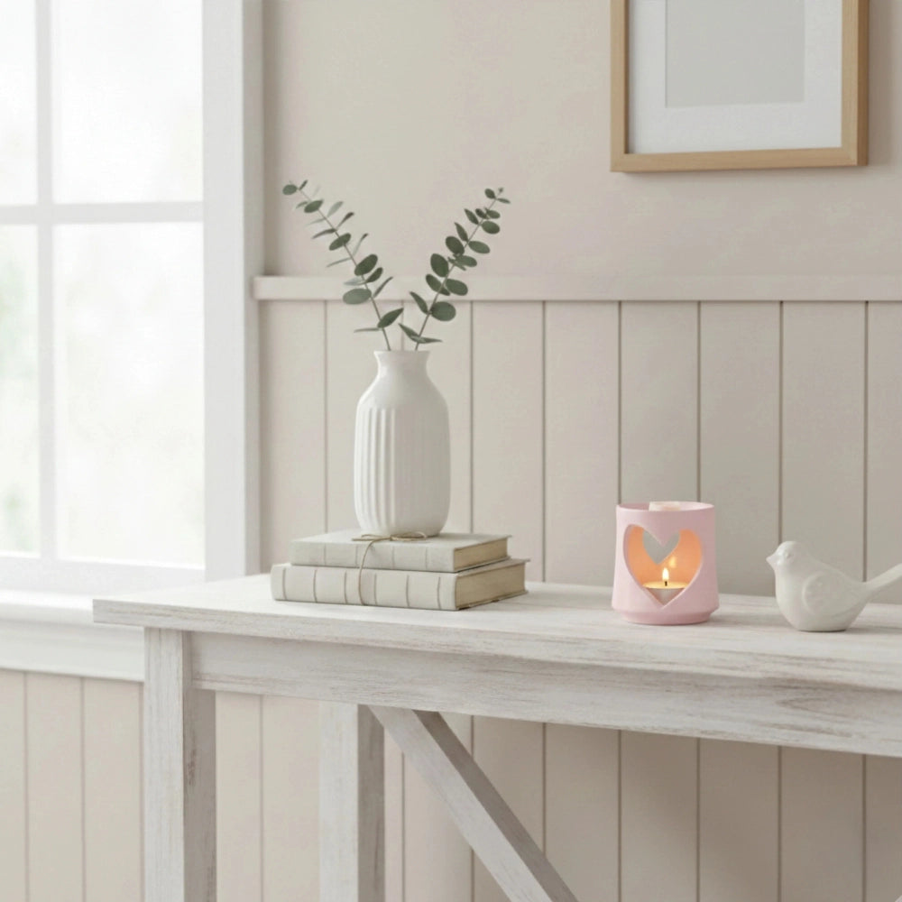 Country Heart Cut-Out Wax Melter pale pink ceramic on tabletop with bird figurine and décor accents