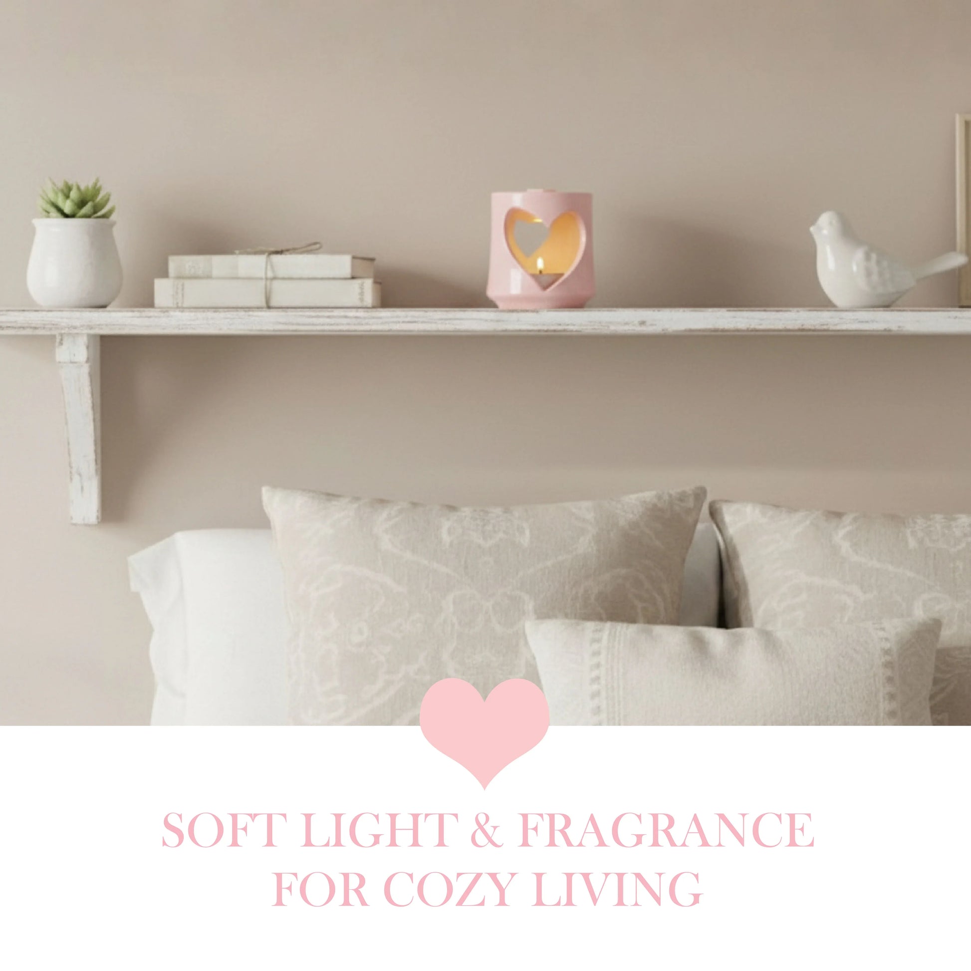 Decorative shelf with a candle and books above pillows, with text 'Soft Light & Fragrance for Cozy Living'.

