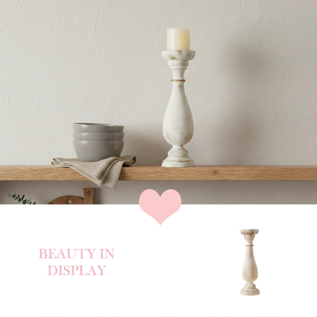 Decorative shelf with a candle holder, bowl, and towel against a plain wall.