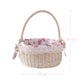 Wicker basket with floral lining and measurements on a white background