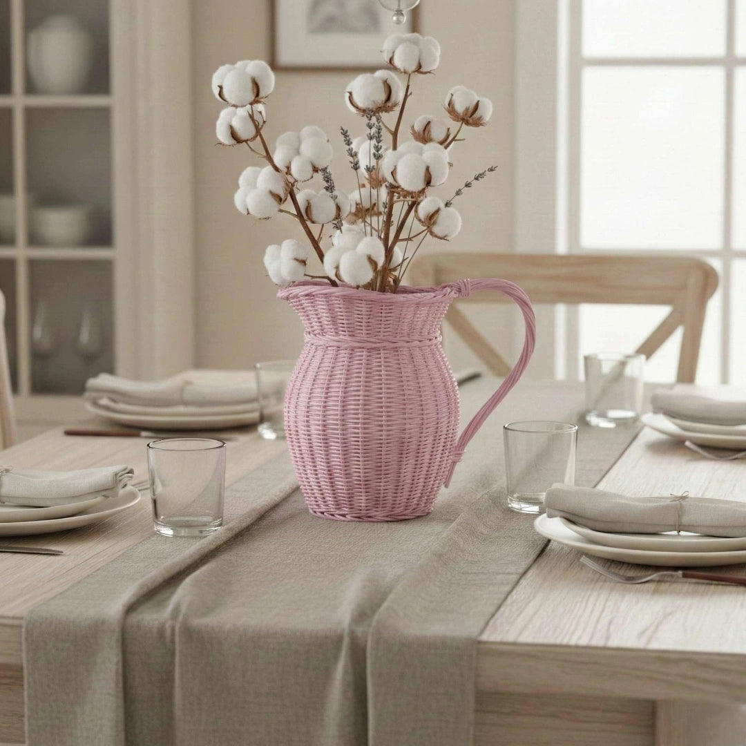 Farmhouse Wicker Jug Pale Pink with cotton branches on dining table