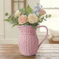 Farmhouse Wicker Jug Pale Pink filled with flowers on wooden surface home decor display