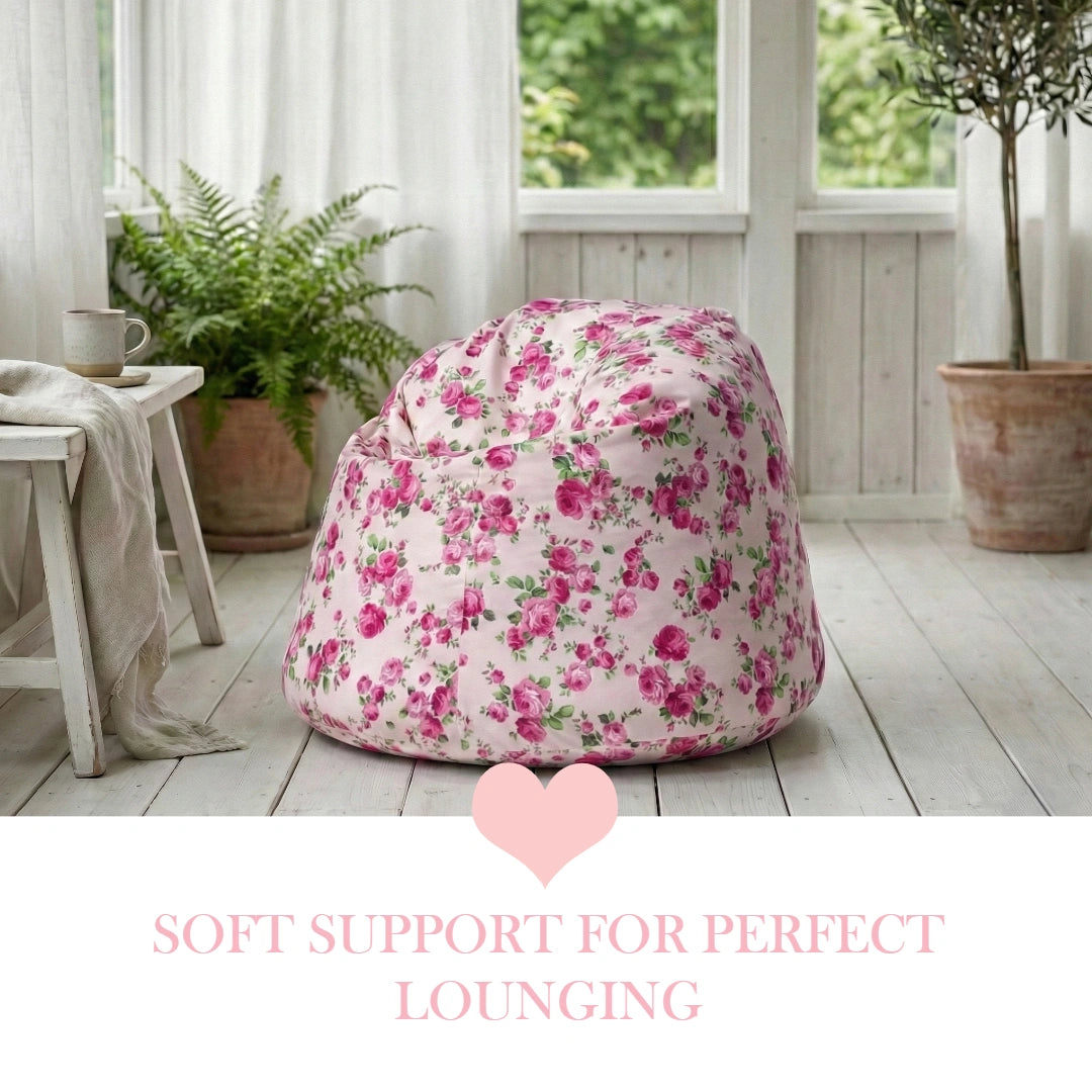 Fleur Bean Bag with floral pattern in bright room with plants and heart symbol