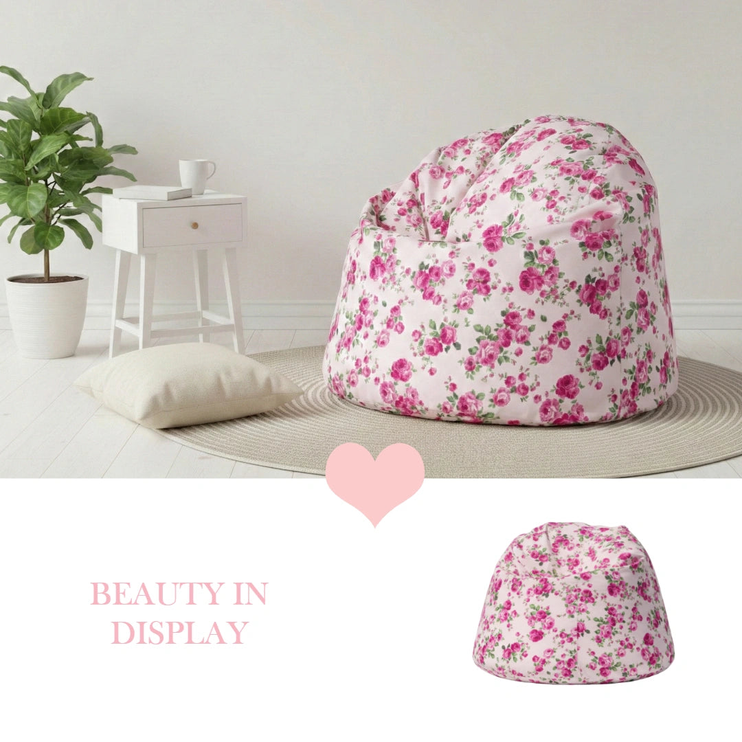 Fleur Bean Bag with floral pattern beside plant and table on light gray floor