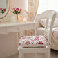 Fleur Chair Cushion displayed with floral design for home seating decor