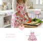 Fleur Country Kitchen Apron worn while cutting vegetables in kitchen floral design cooking use