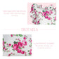 Decorative antique white pillow with floral pattern on a white background