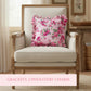 Beige armchair with pale pink floral pillow in a room setting