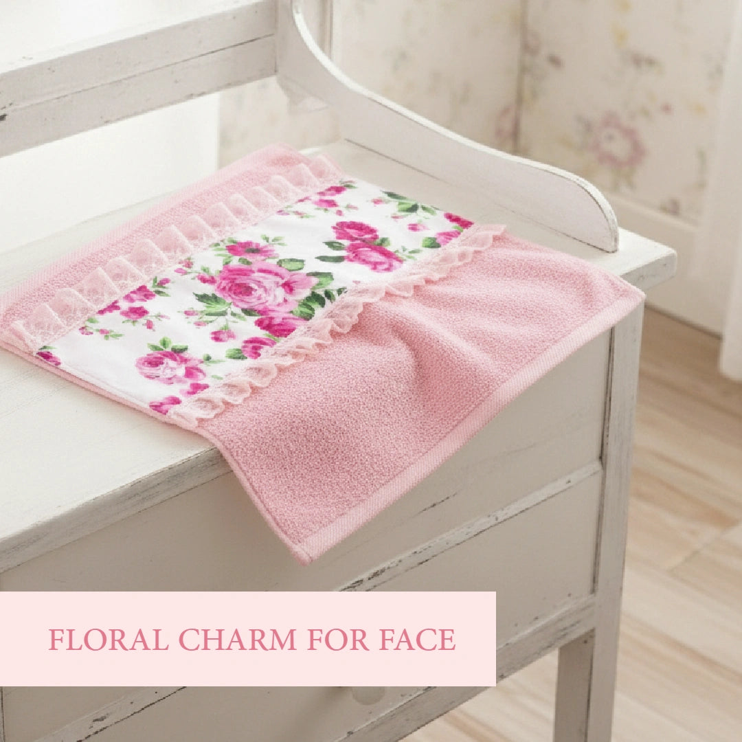 Fleur face towel pink floral design on white wooden surface with product text Floral Charm for Face