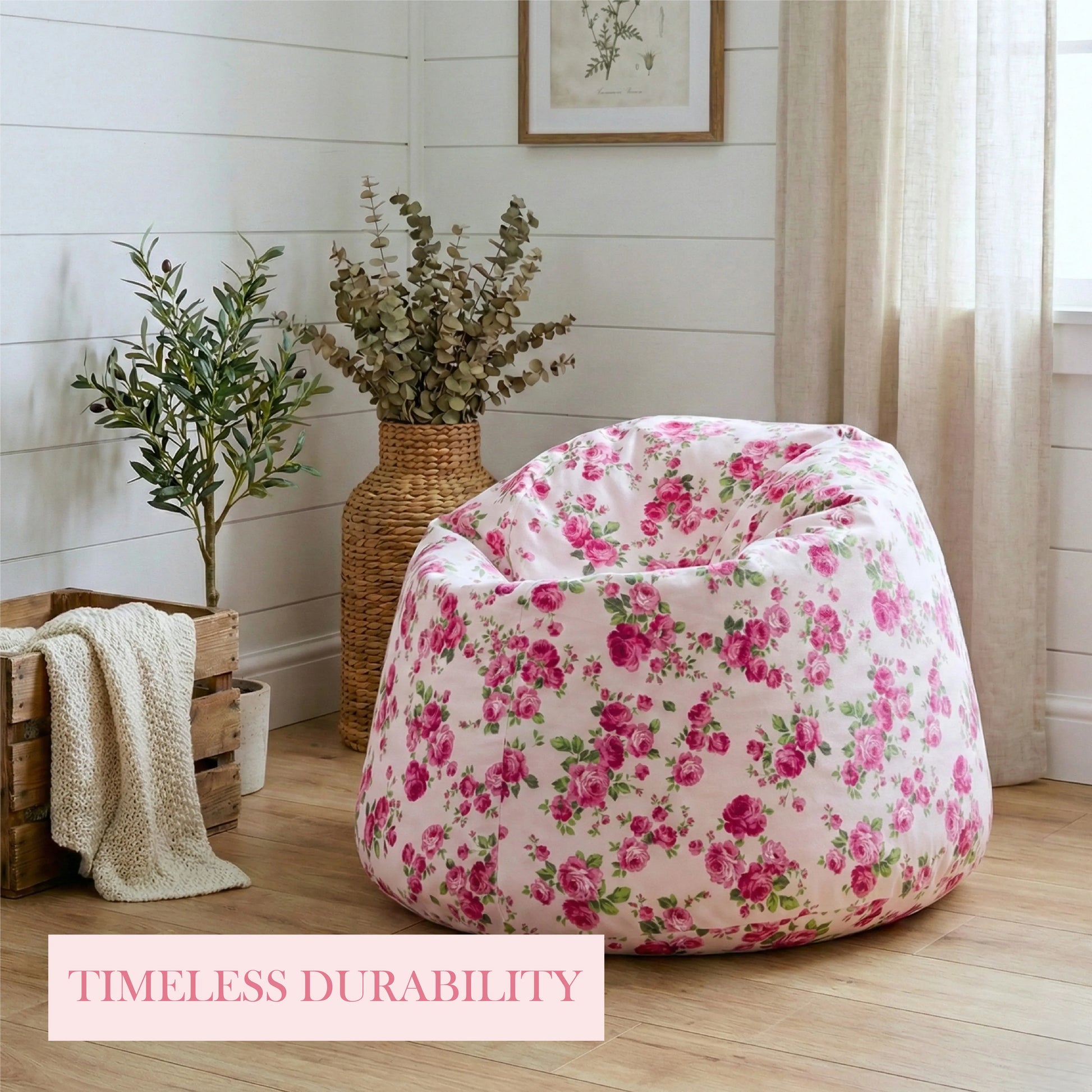 Floral bean bag chair in a room with plants and a wooden crate.

