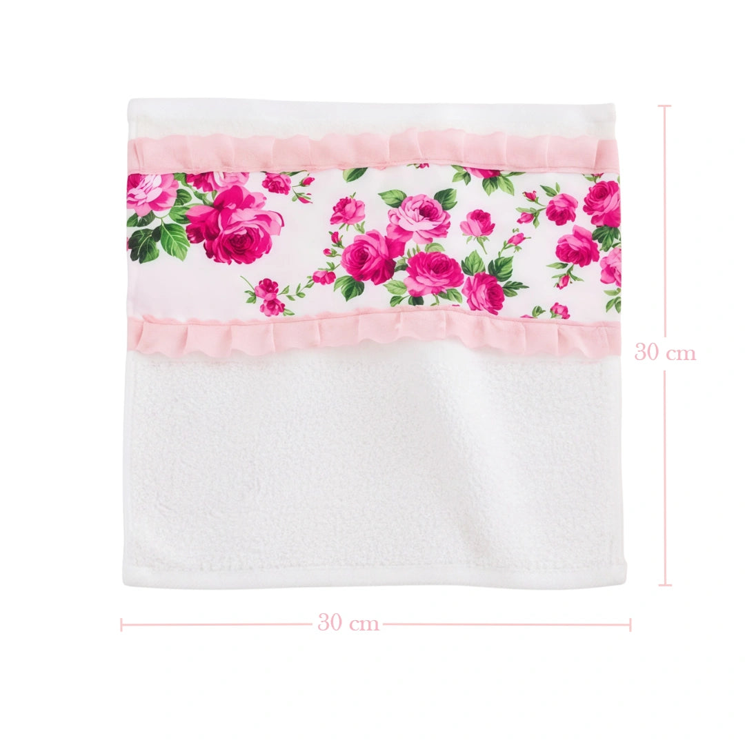 Floral patterned fabric with pink trim and measurements on a white background