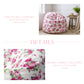 Floral-patterned bean bag chair in a room with text about its features.

