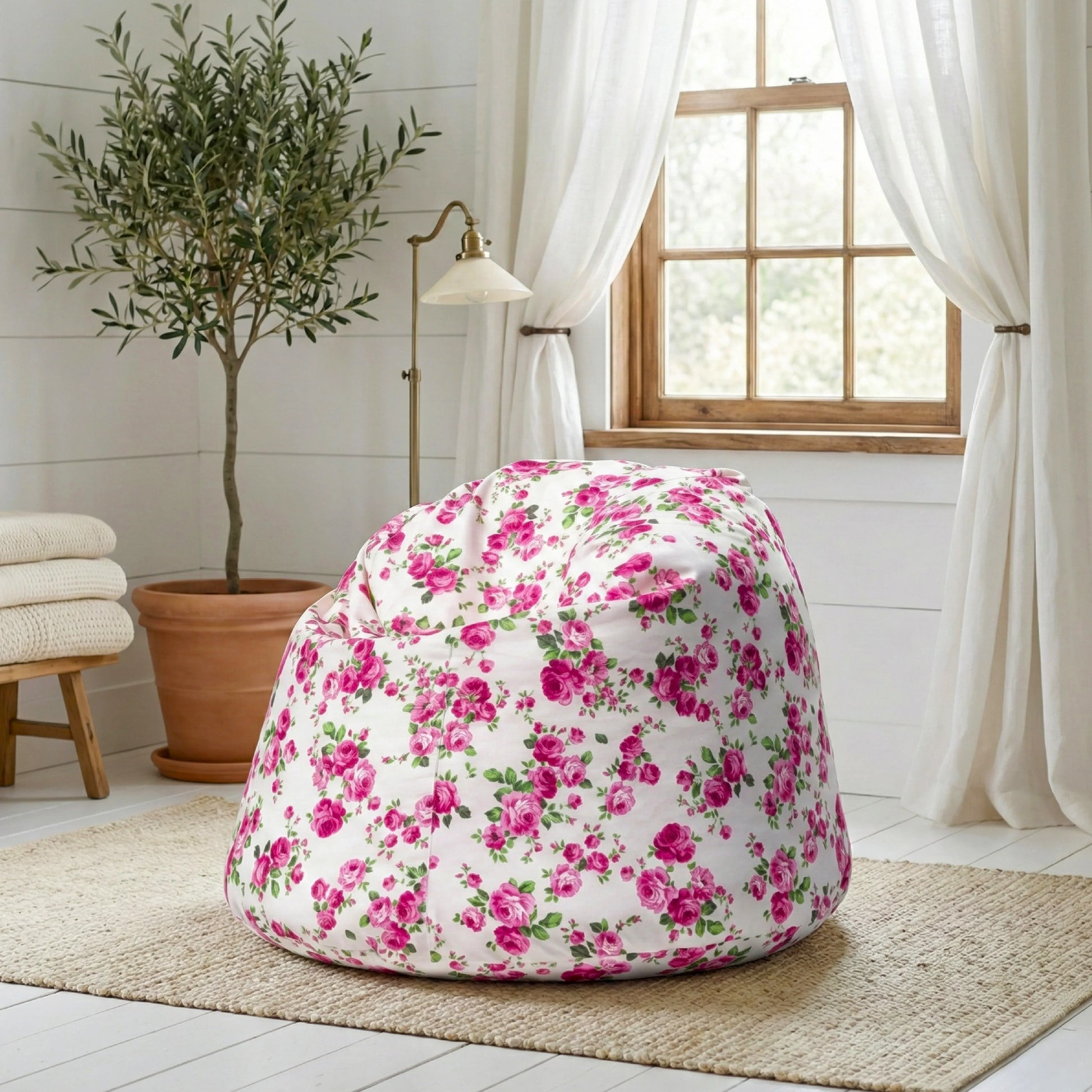 Floral-patterned bean bag chair in a room with a plant and window.

