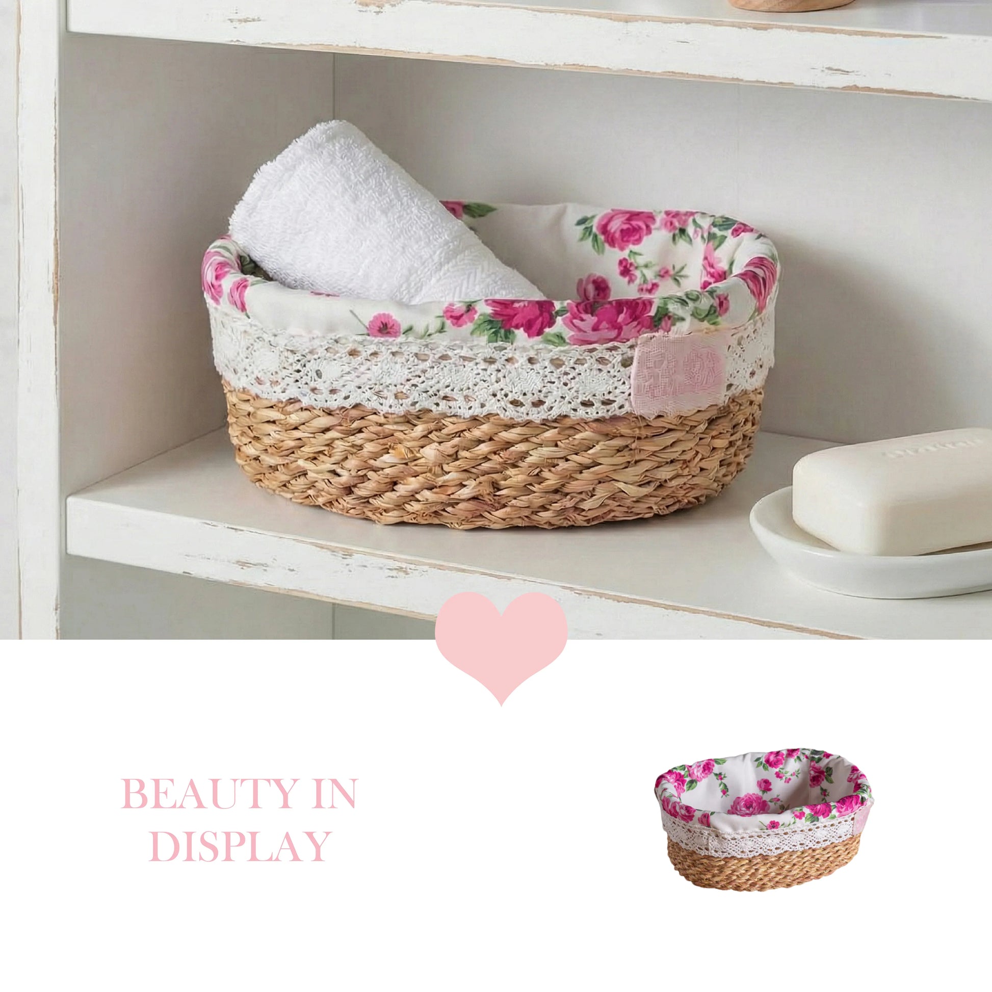 A fleur oval halfa basket with a pink floral liner holding a white towel on a white distressed bathroom shelf.