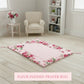 Fleur Haven Padded Prayer Rug floral design placed in room setting with chair and bookshelf décor