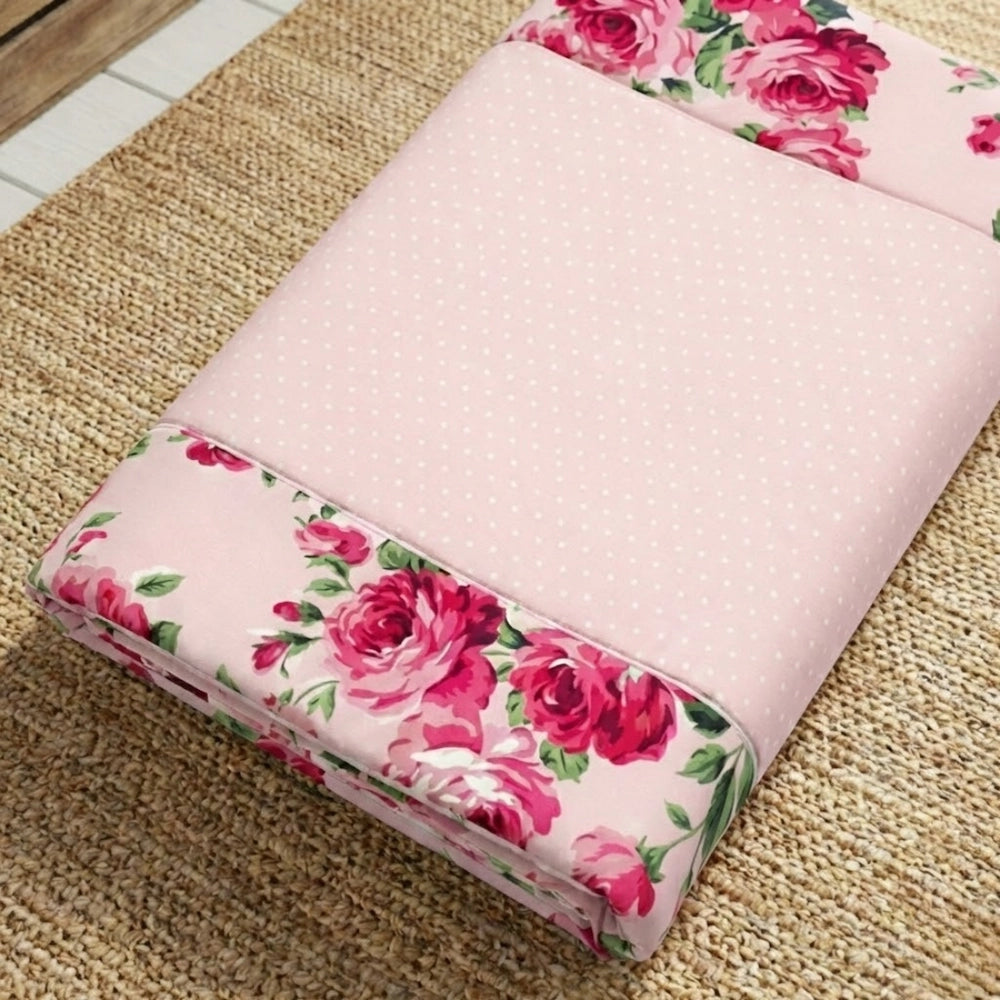 Fleur Haven Padded Prayer Rug rolled displayed on textured surface for home décor and prayer use