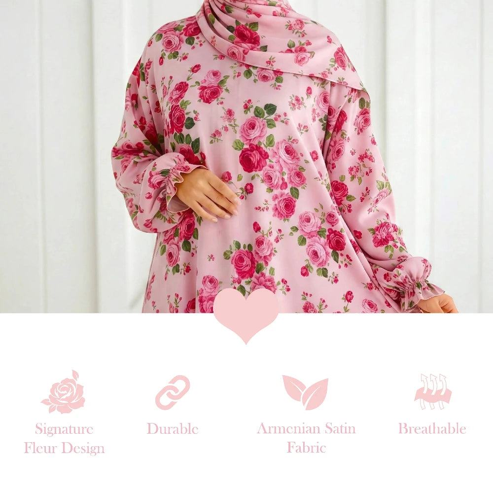 Pink floral Isdal Prayer dress with a white background