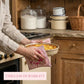 Person holding a dish of food in a rustic kitchen with 'Timeless Durability' text.