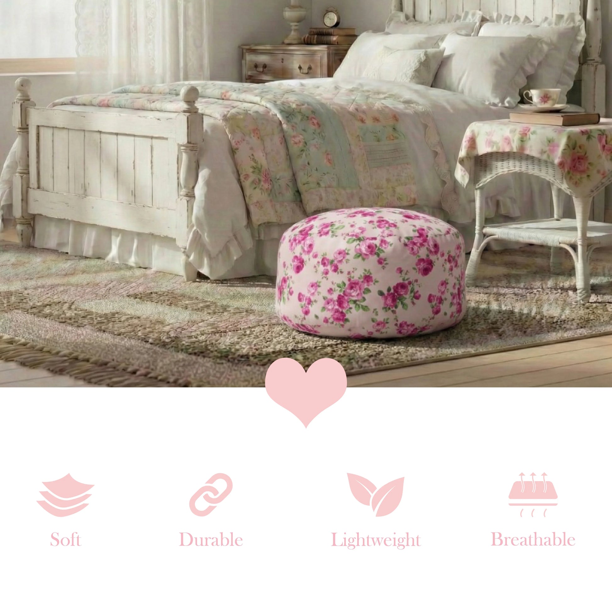 A pink rose fleur pouf in a shabby chic bedroom featuring a white distressed wooden bed frame, patchwork quilt, and vintage wicker side table.