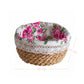 A round halfa grass basket with a pink rose fabric liner and white lace trim, featuring dimension labels of 20 cm diameter and 10 cm height.