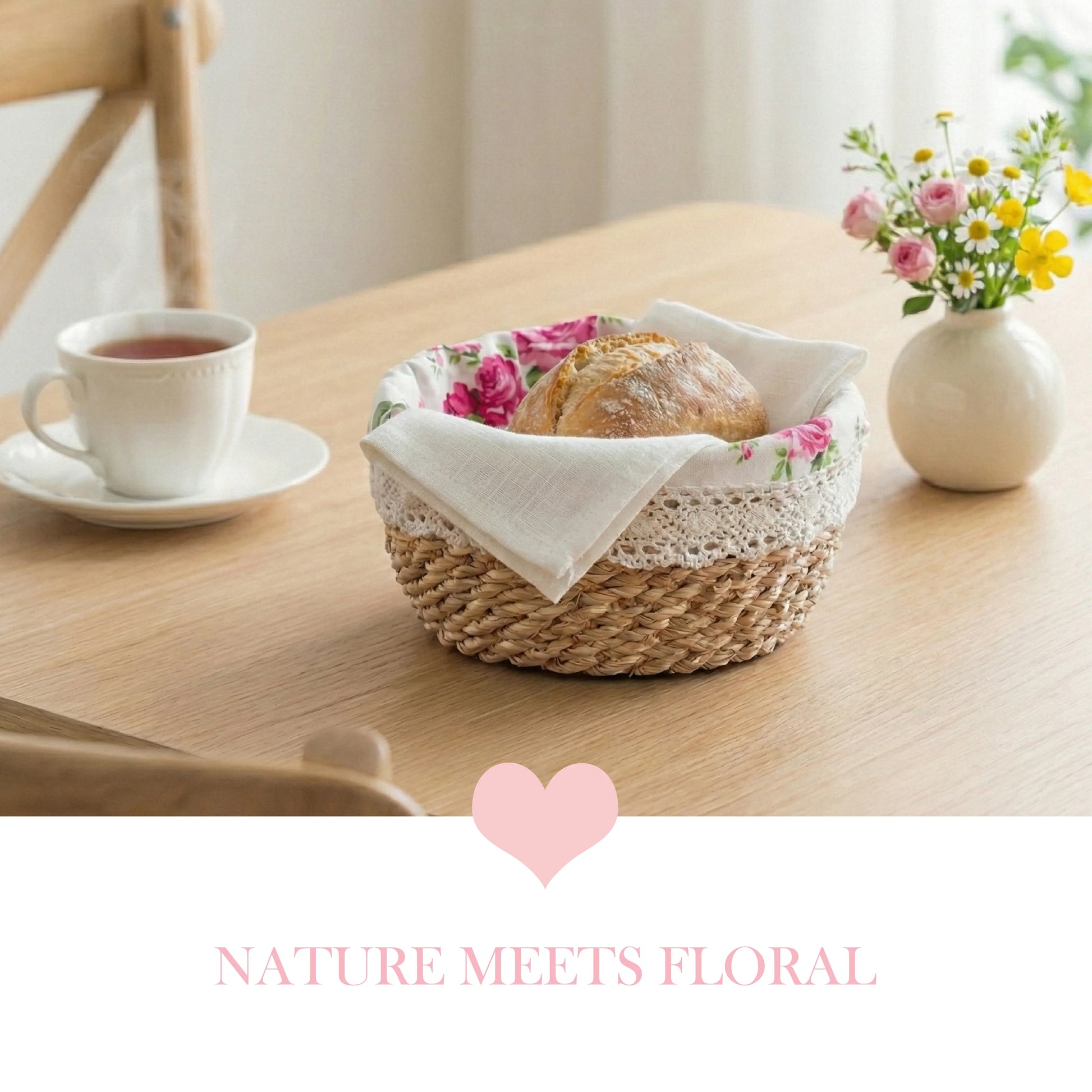 Round halfa grass basket with rose liner and lace, serving bread with a napkin on a wooden dining table.