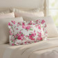 Fleur Ruffled Rectangular Cushion with Filling antique white placed on bed with beige bedding styling