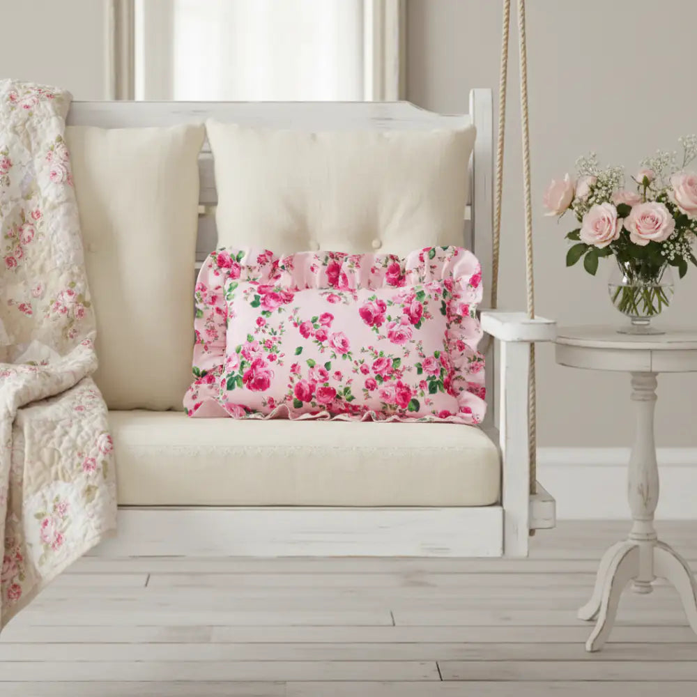 Fleur Ruffled Rectangular Cushion with Filling pale pink displayed on white swing with floral vase background home décor 