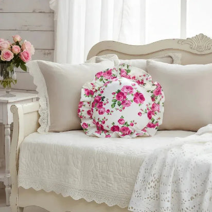 Fleur ruffled round cushion in antique white with pink roses on farmhouse daybed country charm
