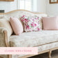 Fleur Ruffled Square Cushion with Filling antique white displayed on vintage sofa with floral and pink cushions