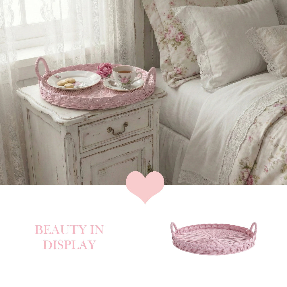 Floral bedding and a pink woven wicker tray with a tea set on a white nightstand.