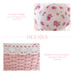Floral fabric lined Cottage Round Wicker Basket with bamboo wood craft details on a white background