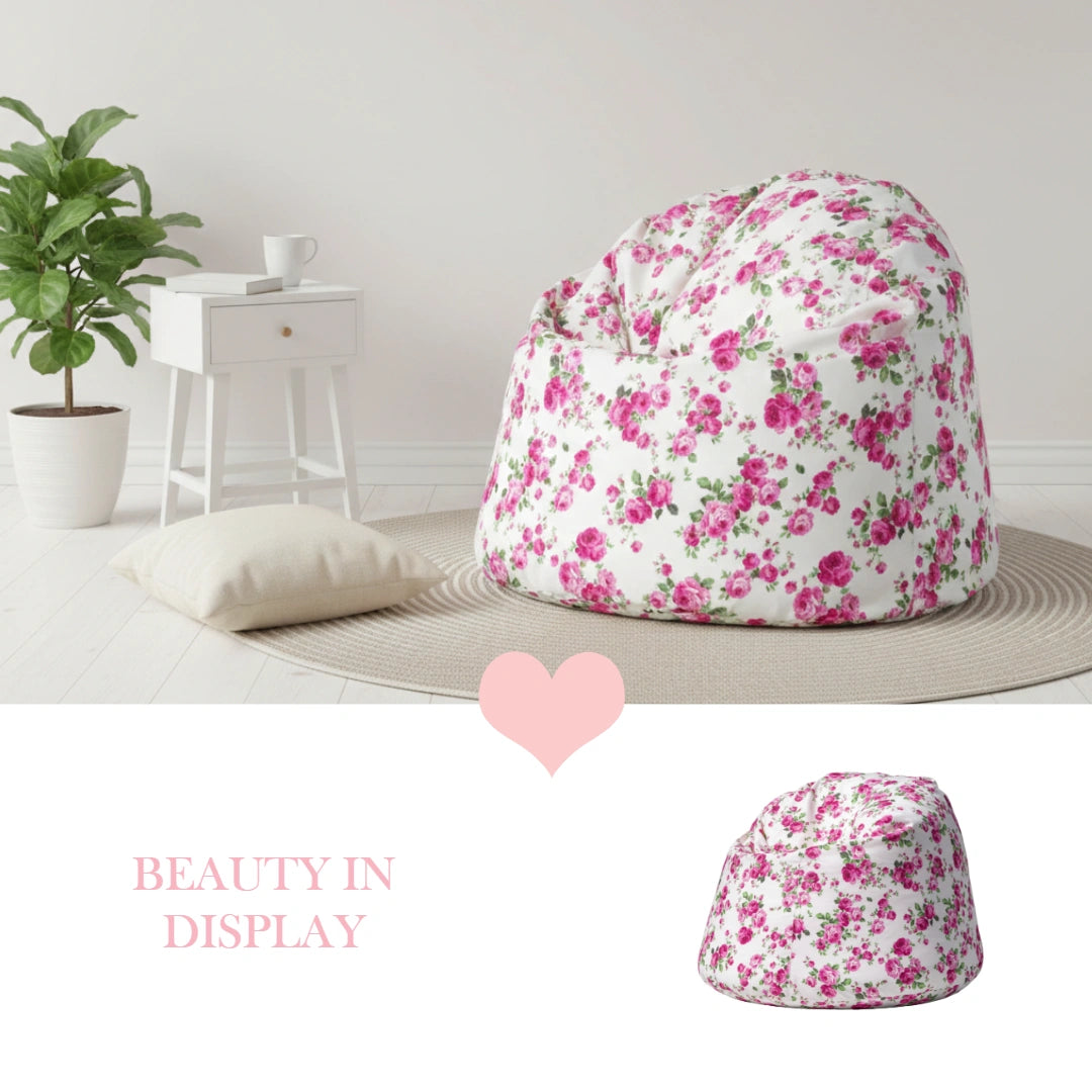 Floral-patterned bean bag chair in a room with a plant and small table.