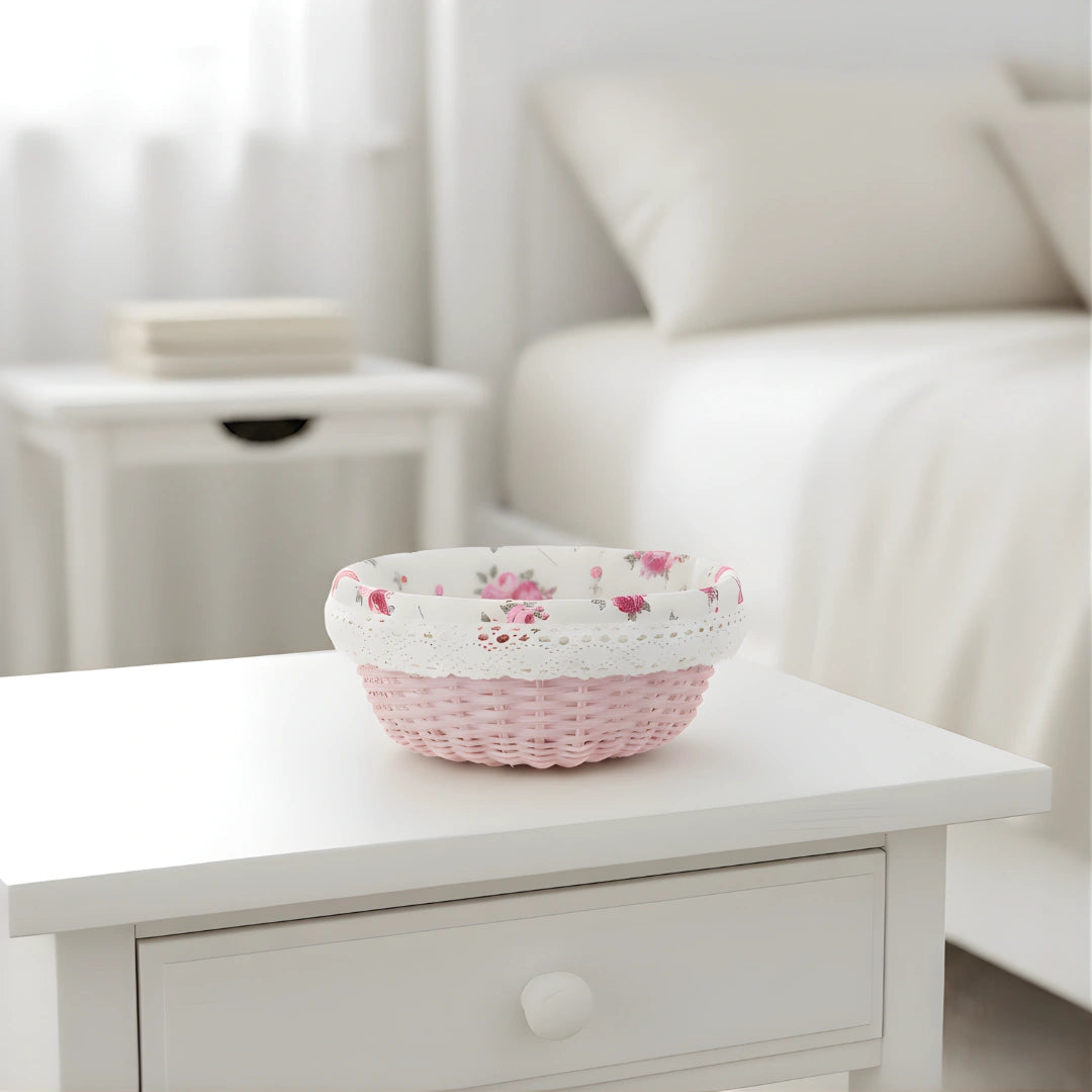 Floral-patterned Cottage Round Wicker Basket on a white table with a blurred background