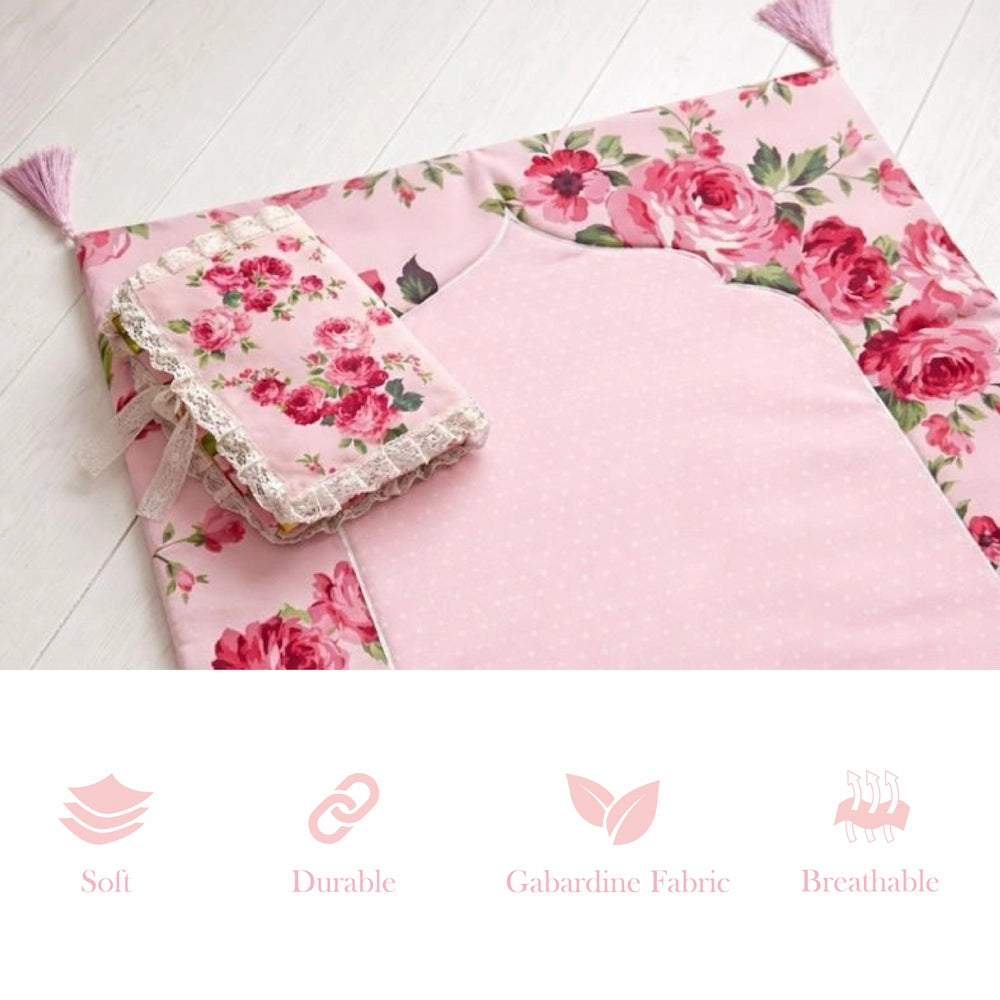 Floral-patterned quran cover fabric with a matching pouch on a light wooden floor.