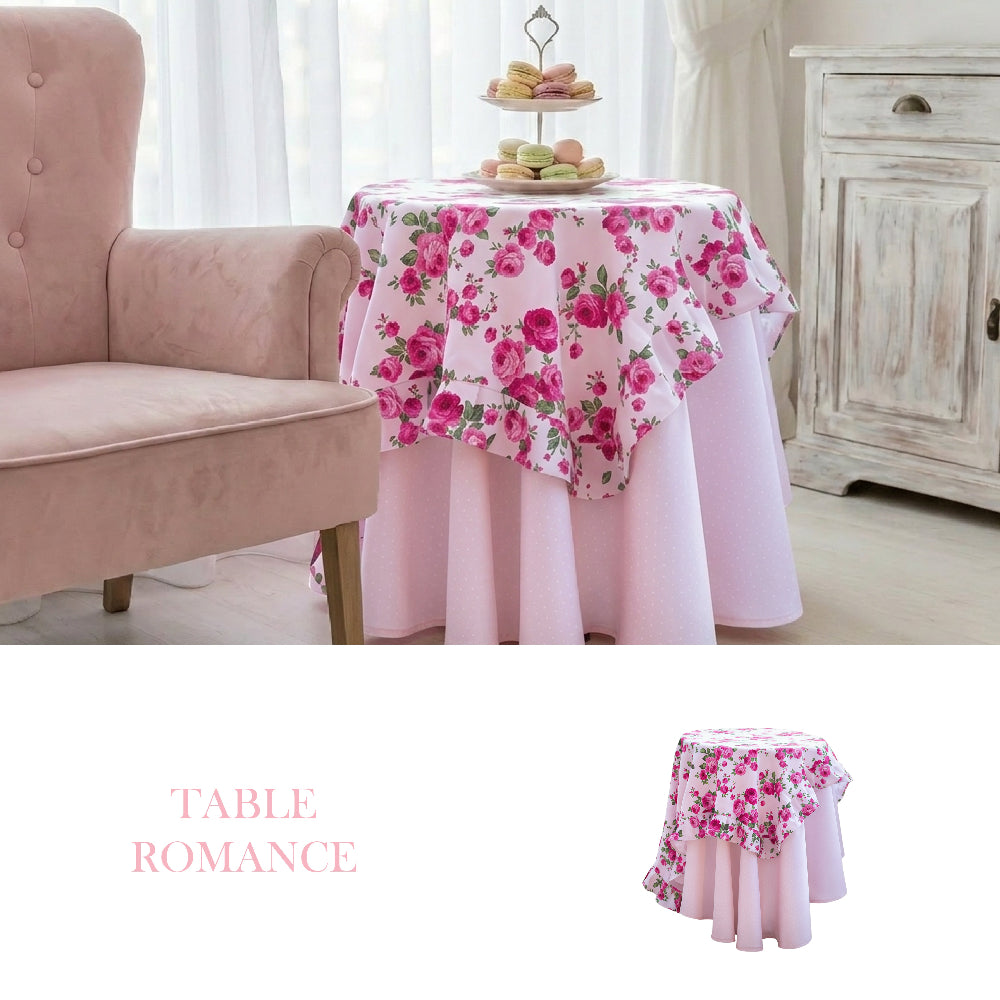 Floral tablecloth on a small table with a pink chair and wooden cabinet in the background.