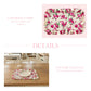 Two-panel product display featuring a pink floral ruffled placemat on a pink background and a wooden table setting.